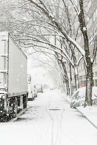 new york gray truck on snowy road road